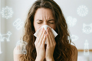 a girl sneezes into a napkin, a Person Photo by itakdalee
