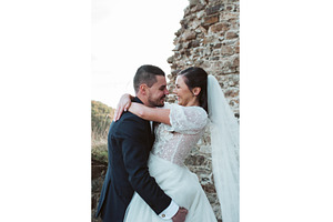 Groom lifting and hugging bride., a Person Photo by HalfPoint