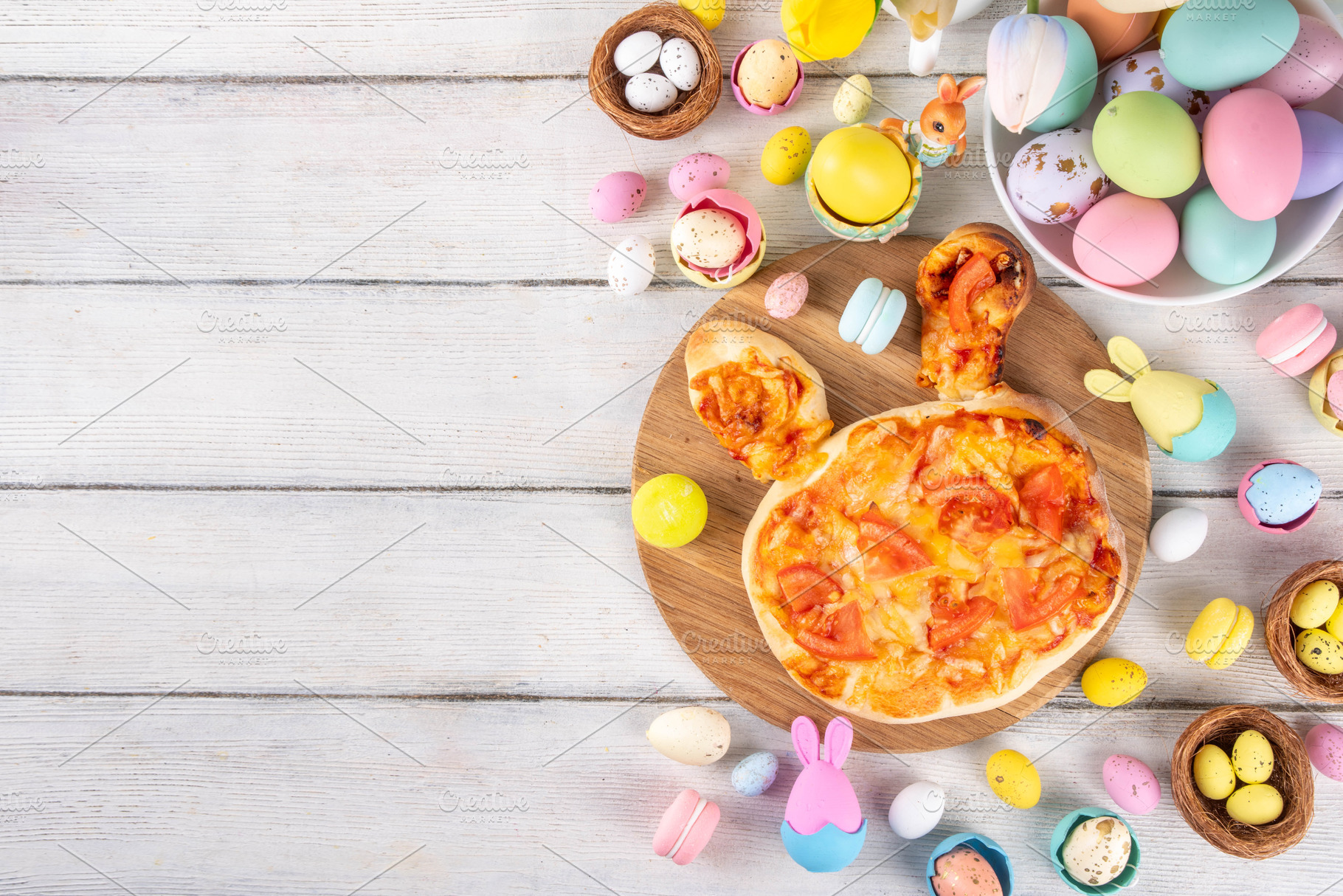 Cute Easter pizza with bunny ears and in form of Easter eggs, a Food & Drink Photo by Rimma