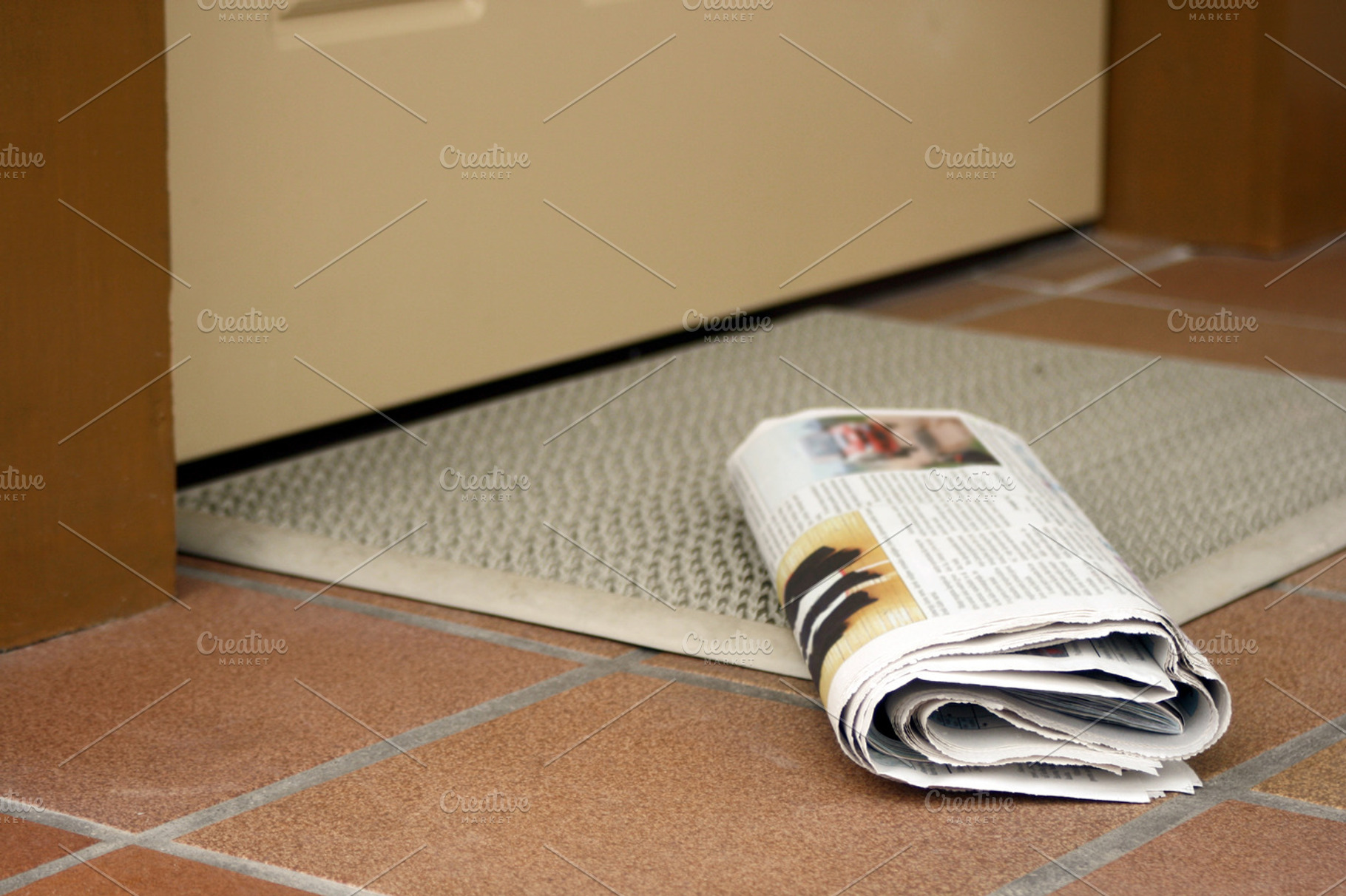 Daily newspaper ant doorway, an Arts & Entertainment Photo by BOOCYS