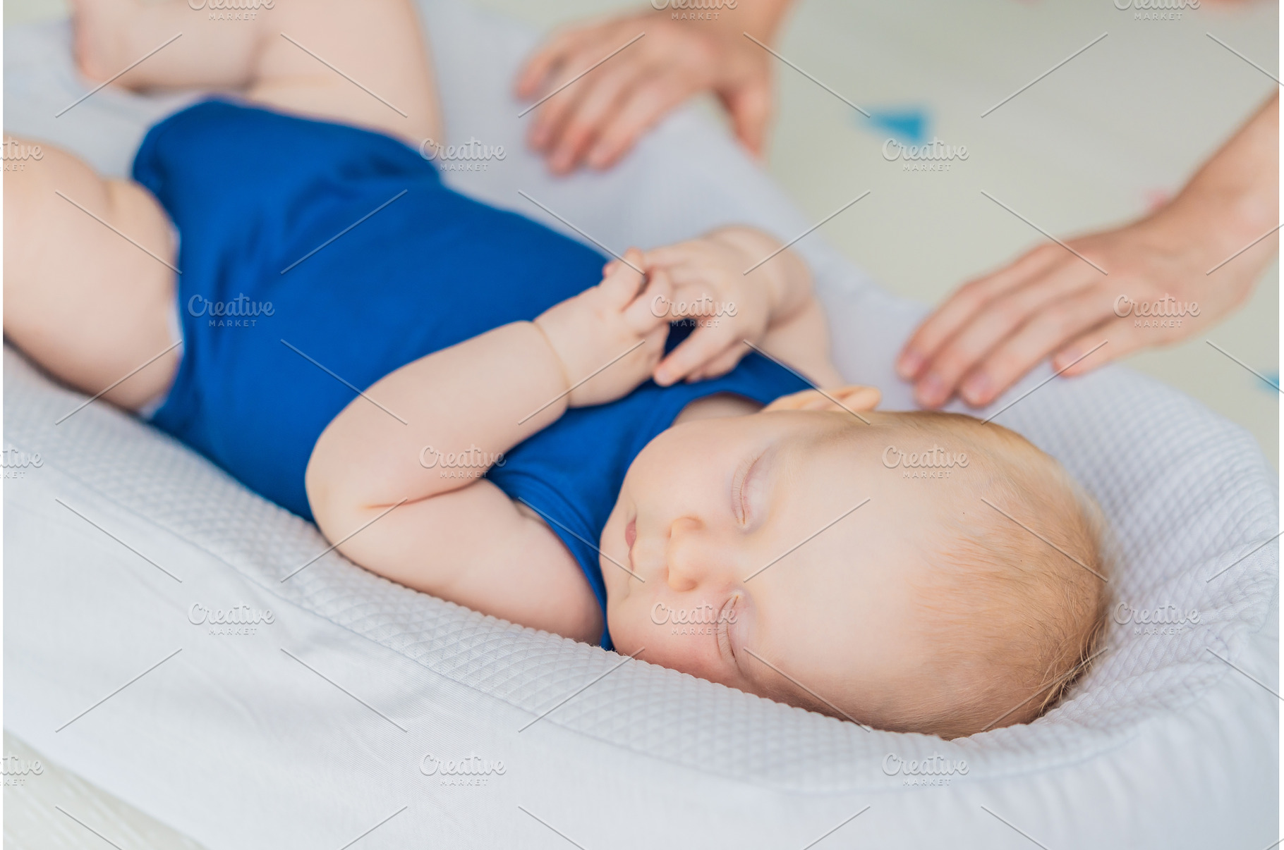 Chubby 3-month-old baby peacefully, a Person Photo by Elizaveta Galitskaya