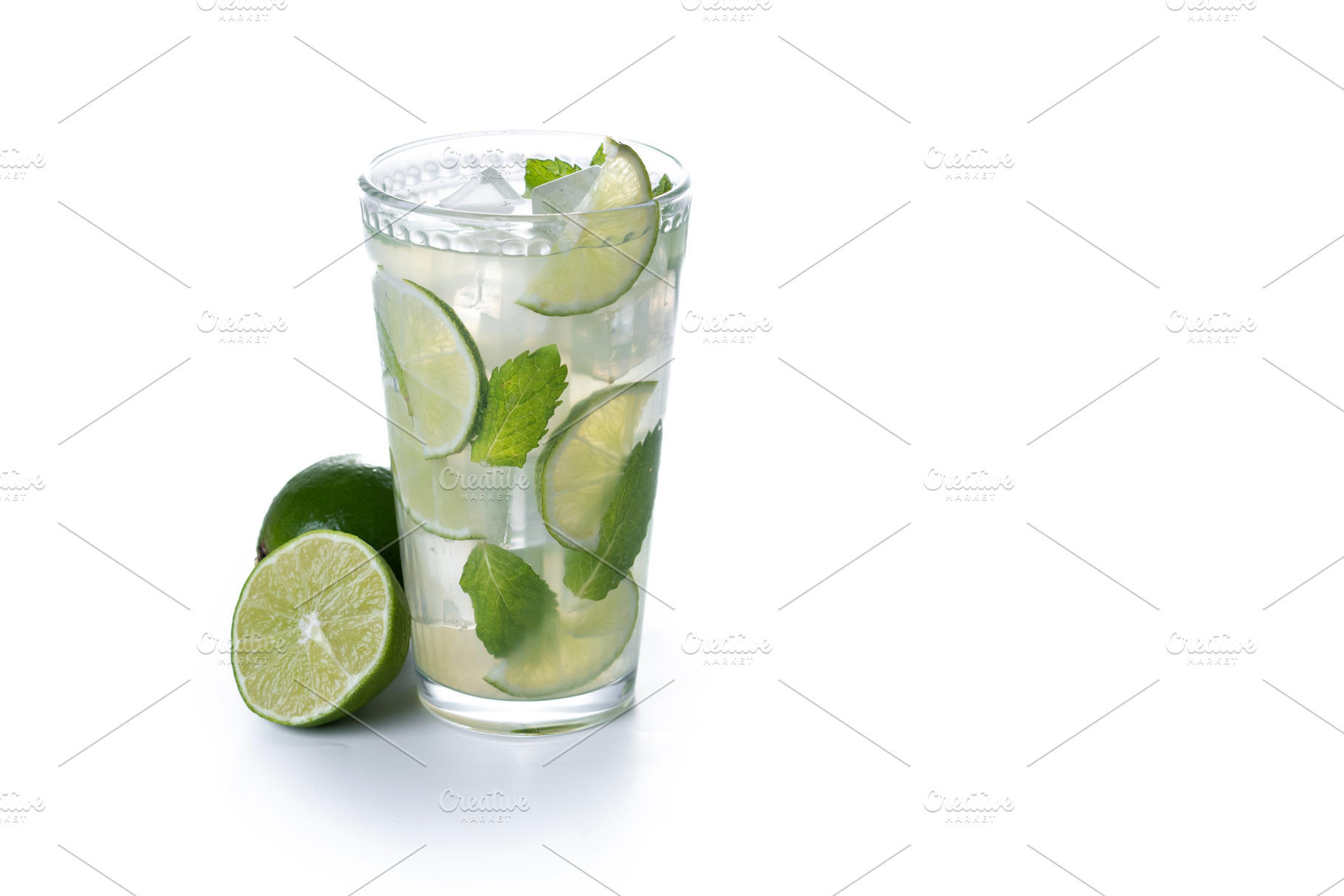 Fresh mojito cocktail with lime, mint and ice in glass, a Food & Drink Photo by etorres69
