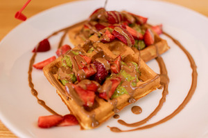 Waffles serving strawberry dessert pastry sauce, a Food & Drink Photo by Photo Drive Studio