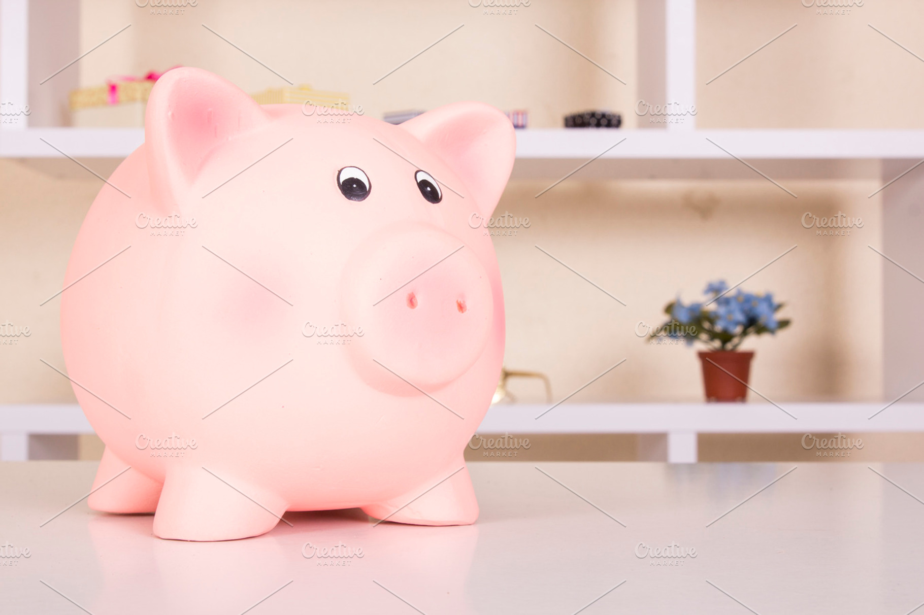 Piggy banks on table, an Abstract Photo by Carlos Die Banyuls