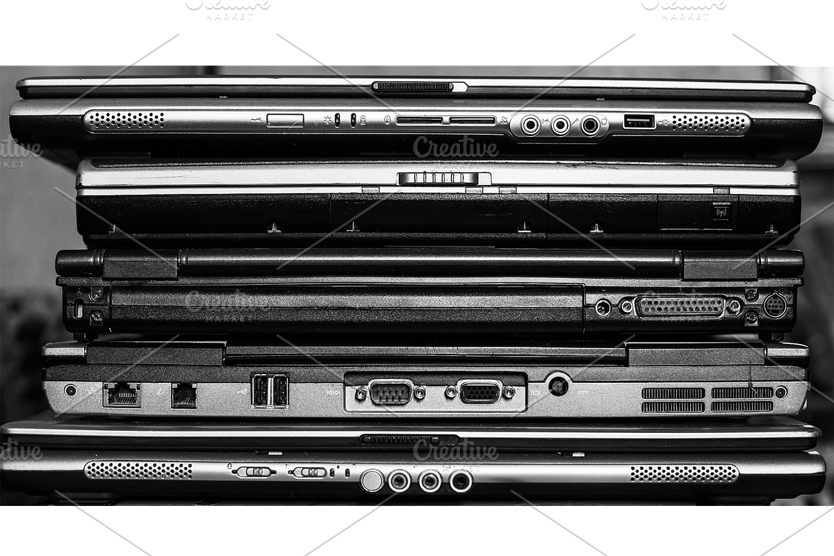 old laptop computers bundle, a Technology Photo by VetalStock (Photo 6 of 7)
