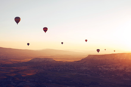 Hot air balloons over the valley featuring cappadocia, balloon, and air