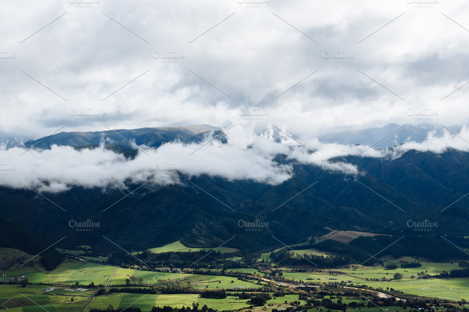 Green Valley With Mountain Range