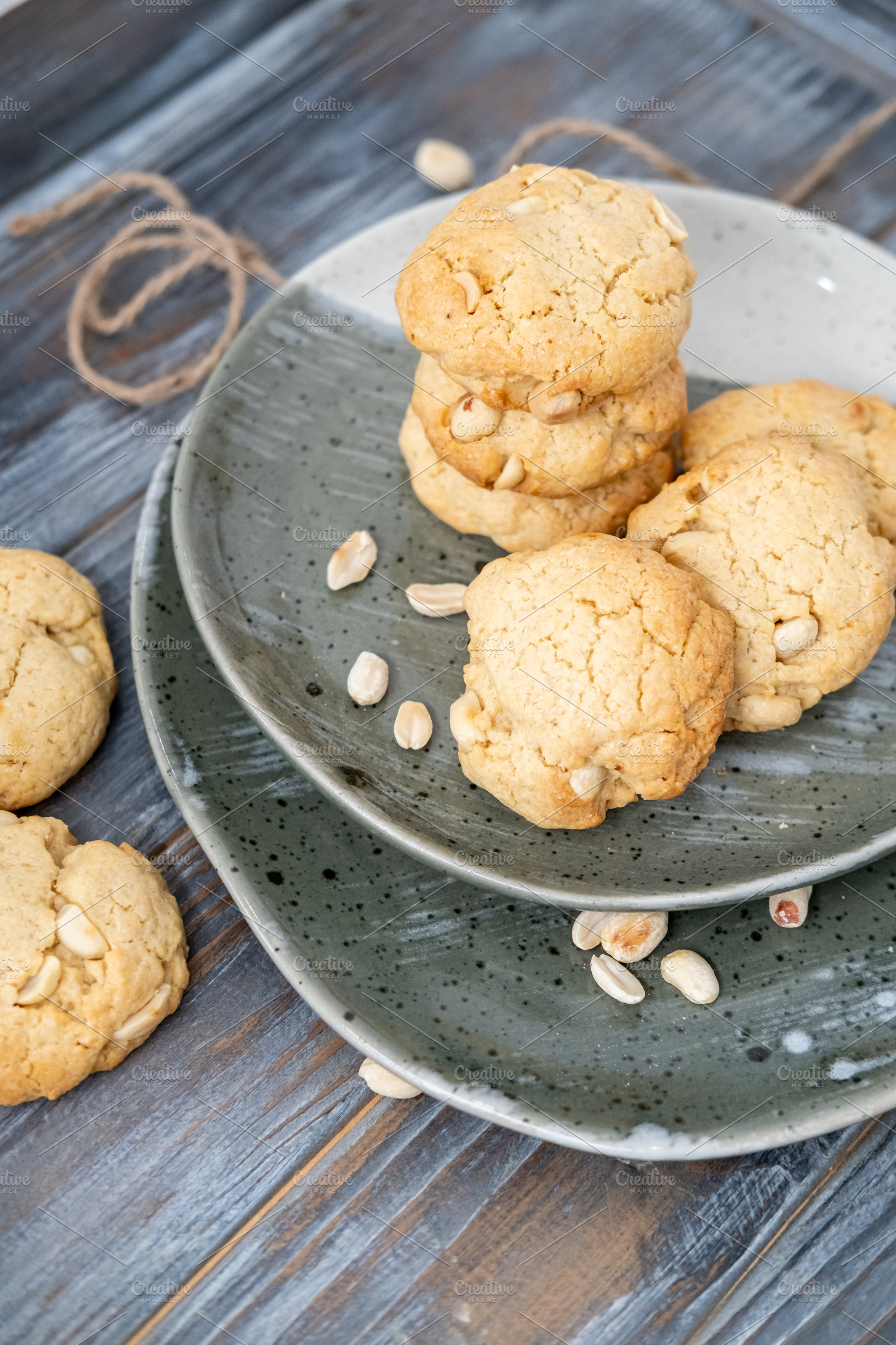Baked cookies tasty food served peanut table plate, a Food & Drink Photo by Photo Drive Studio