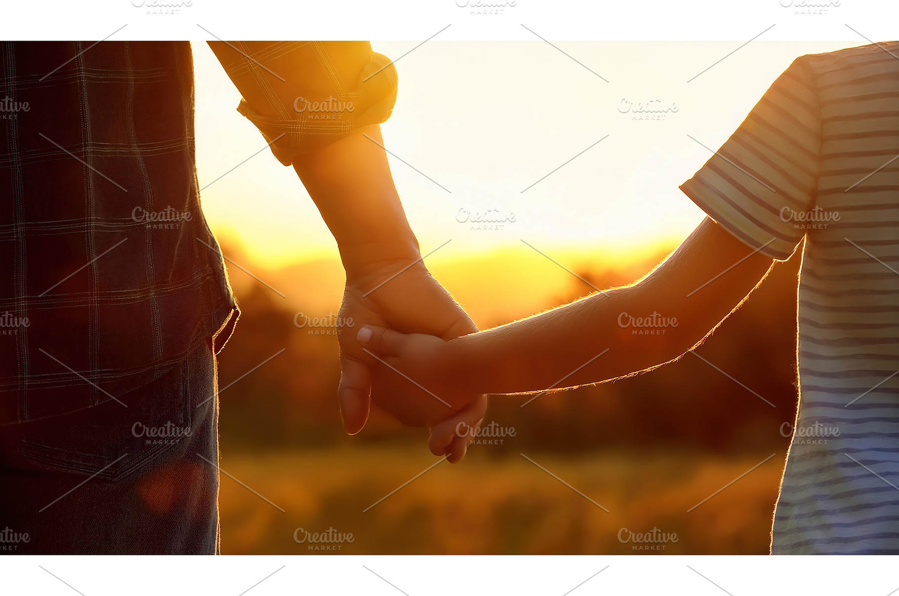 An adult and child holding hands, a Nature Photo by Igor Tichonow