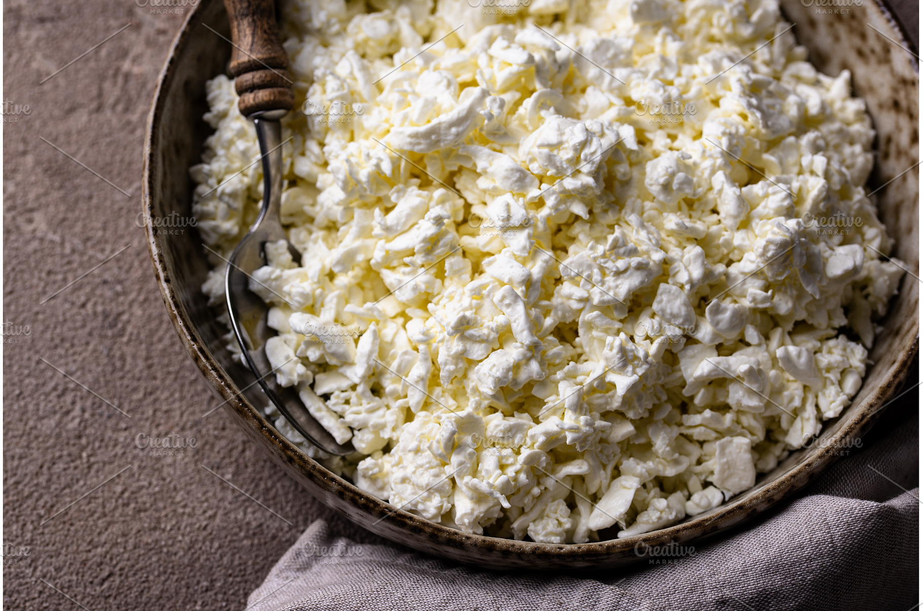 Cottage cheese on light background, a Food & Drink Photo by Yulia Furman