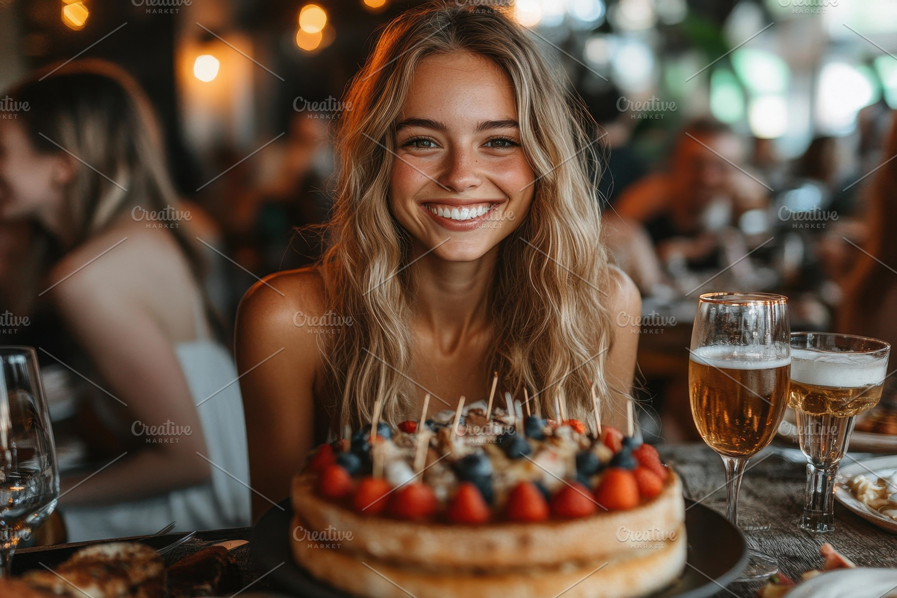 Smiling girl celebrates birthday wit, a Photo by Tanuart