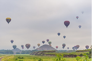 Colorful hot air balloons floating, an Architecture Photo by Elizaveta Galitskaya