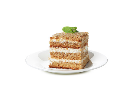 Concept of sweets, honey cake, isolated on white background, a Food & Drink Photo by AtlasStudio PRO