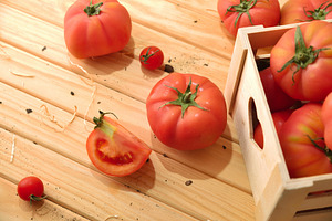 Fresh Tomatoes with Wooden Crate and Sliced Tomato, a Food & Drink Photo by Davizro's Market