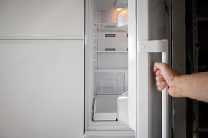 Opening an Empty Refrigerator at Home Before Grocery Shopping, a Food & Drink Photo by etorres69