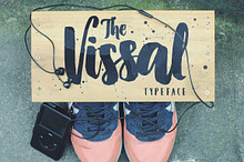 The Vissal script brush logo font
