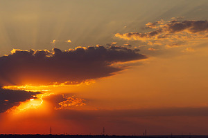 Dramatic sunset sky with sun rays an, a Wallpaper Photo by Elena Vagengeim