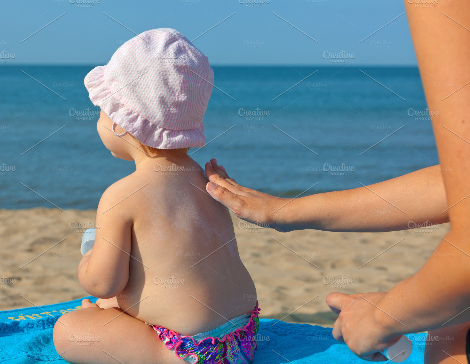 Baby sunscreen cream., a Person Photo by Antonio Gravante Market