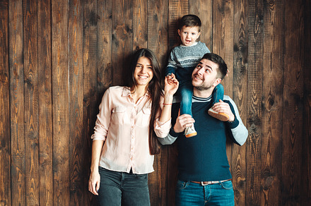 Young family having fun at home stock photo containing family and mom, a Person Photo by Tekso
