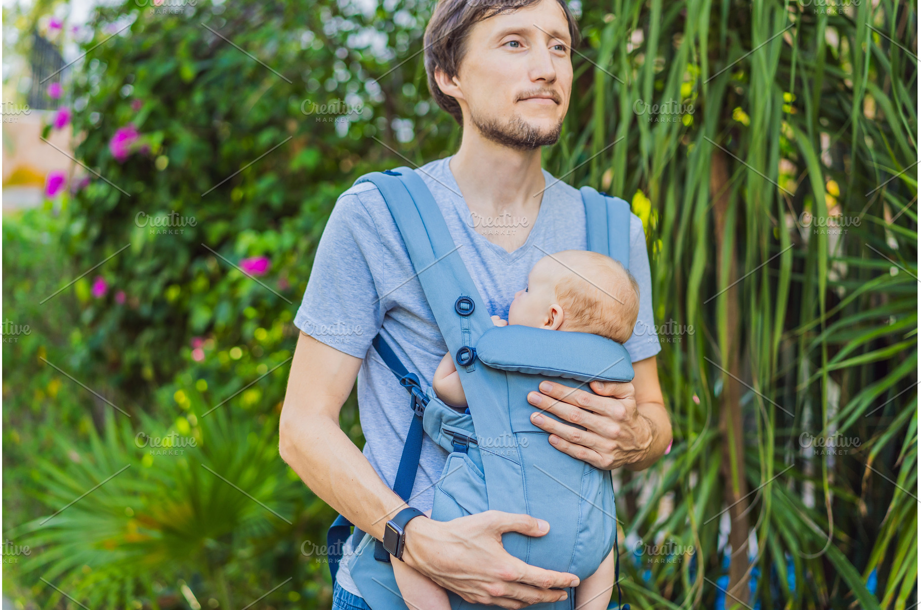 Young father walks in nature with, a Person Photo by Elizaveta Galitskaya