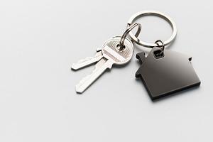 House keys with keychain representing home ownership, a Business Photo by Olena Rudo
