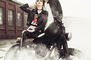 Couple and motorcycle featuring moto, caferacer, and bike, a Person Photo by Aliaksei Kaponia