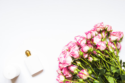 Flatlay with Flowers, a Background Photo by Rose Wine Aesthetic