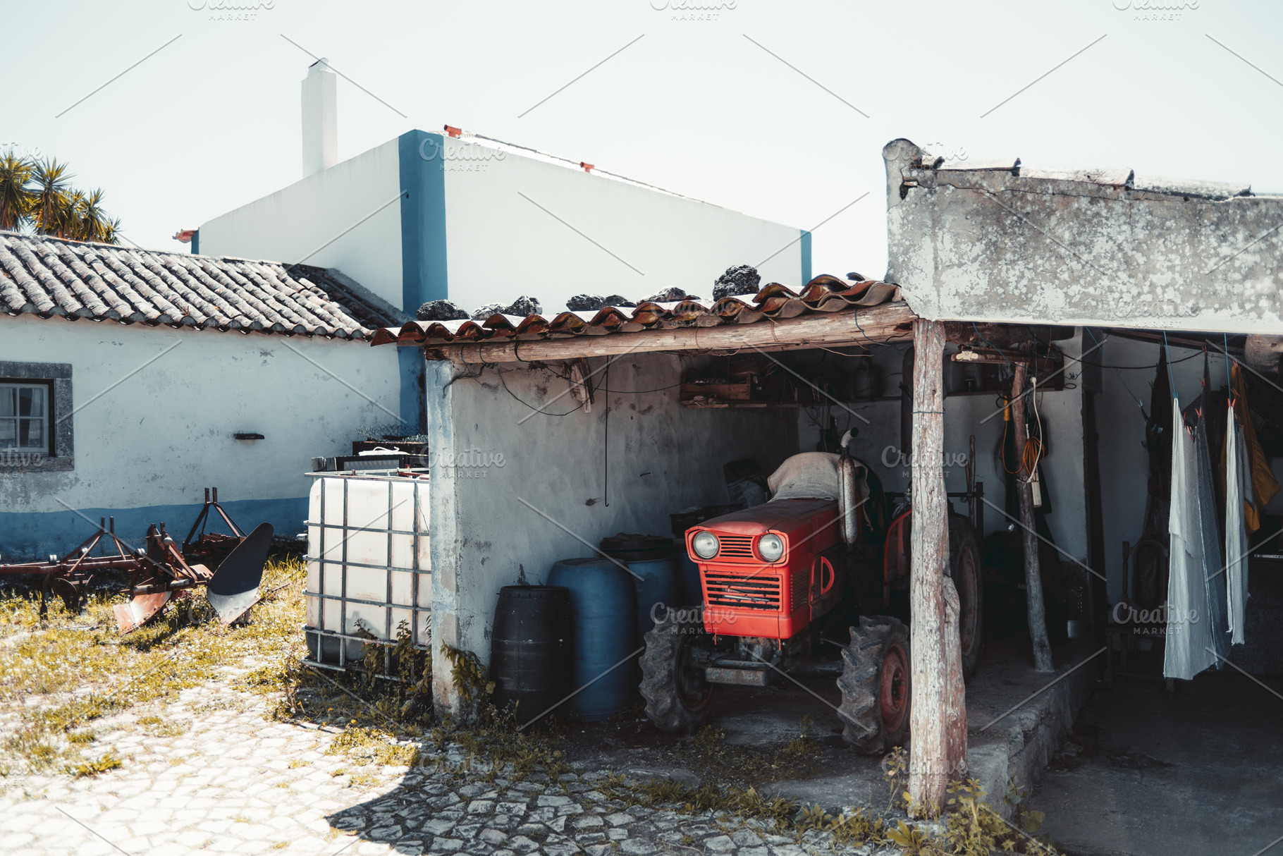Vintage red tractor on farm, an Industrial Photo by SkyNext