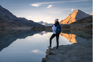 Young woman hiker with backpack, a Person Photo by den-belitsky