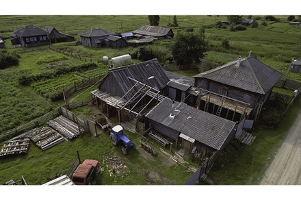 Top view of rustic wooden houses, a Nature Photo by Media Whale Stock