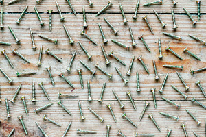 Metal grunge screws flat lay, an Industrial Photo by BOOCYS