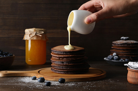 Concept of sweet food, tasty chocolate pancakes, a Food & Drink Photo by AtlasStudio PRO