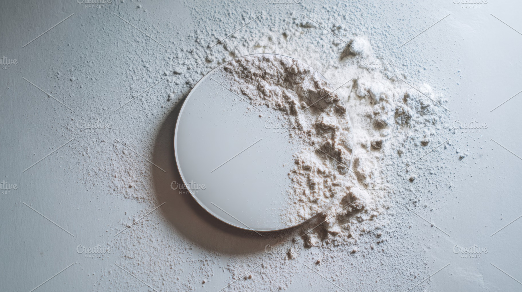 Flour spilled around a white plate, a Photo by Beautiful things