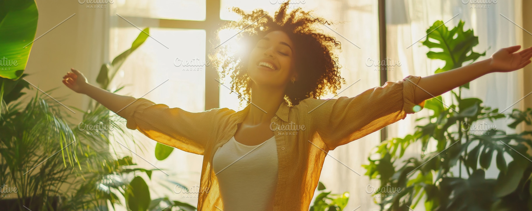 Woman basking in sunlight with arms wide open indoors, an Abstract ...