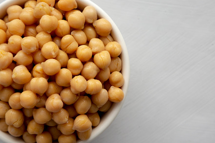Homemade Preserved Chickpeas in a Bowl, top view. Copy space., a Food & Drink Photo by LiudmylaChuhunova