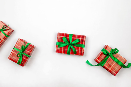 Christmas composition. Red gift boxes with green ribbon at white, a Holiday Photo by vimart
