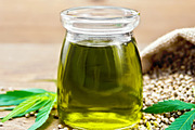 Oil hemp in jar with sheet containing hemp, cannabis, and grain, a Food & Drink Photo by rezkrr (Thumbnail 2 of 2)