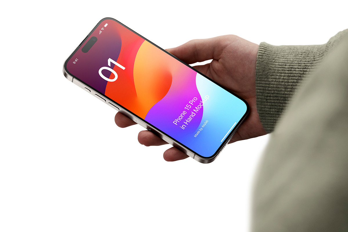 Phone 15 Pro Mockup in Hand, an iPhone Mockup by Asylab (Photo 1 of 4)