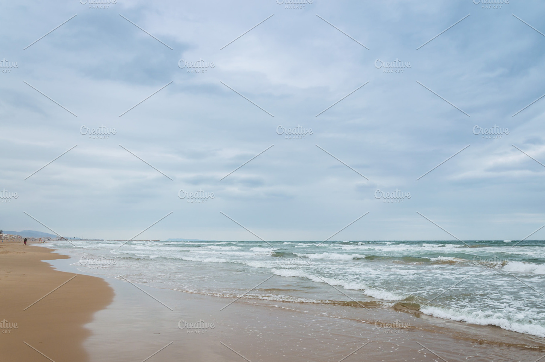 Cloudy summer beach stock photo containing cloudy and summer, a Holiday Photo by Architect´s eye