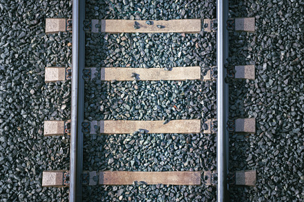 Close-up of train tracks from above., a Transportation Photo by Geasuha