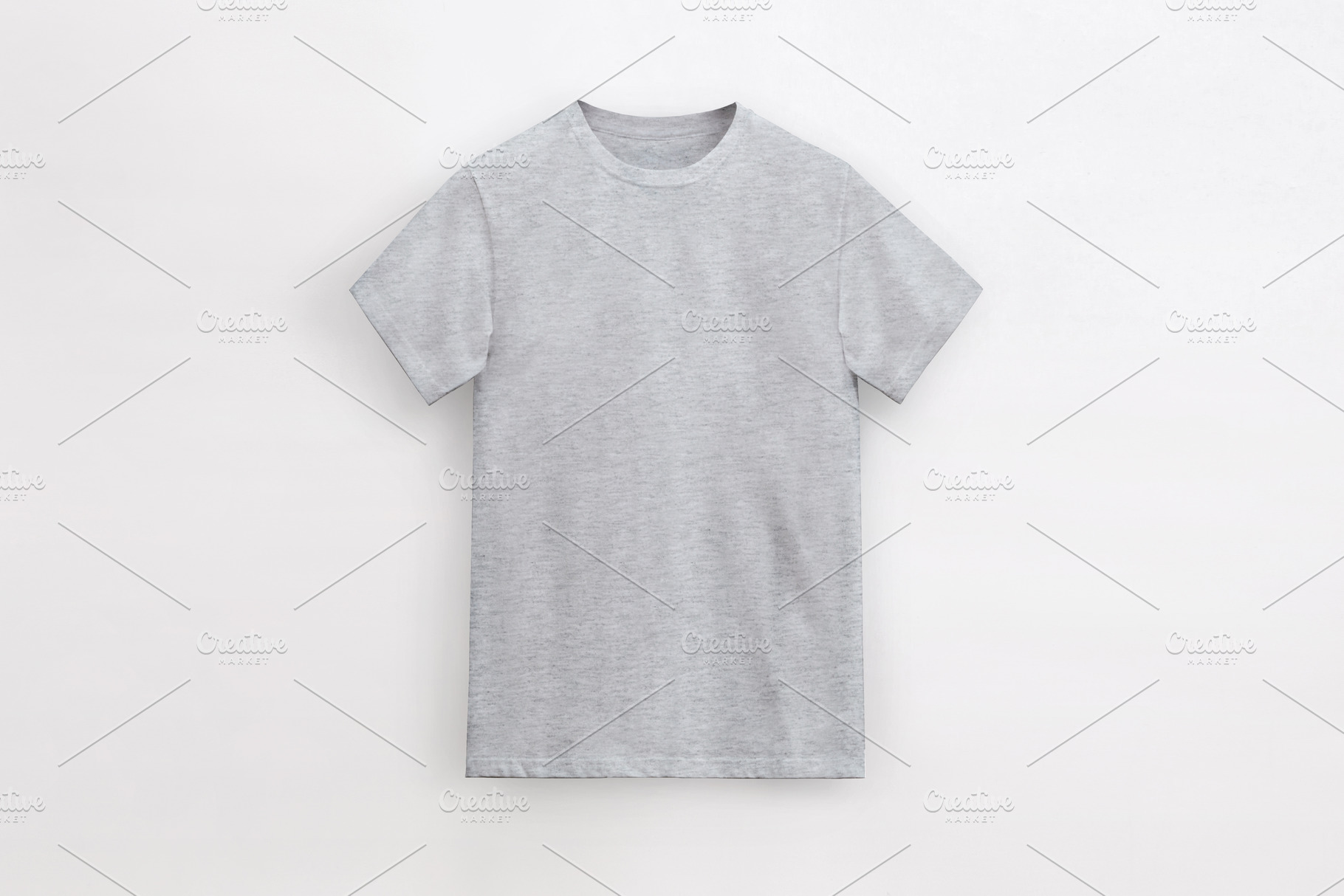 round neck heather grey t-shirt, a Photo by UN-BRANDED