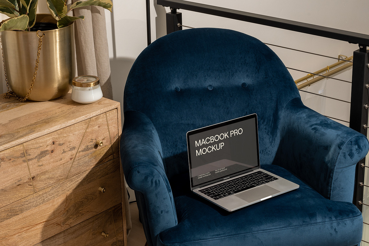 MacBook Pro Mockup Staged with Chair, a Books & Magazine Mockup by Area Mockups (Photo 1 of 4)