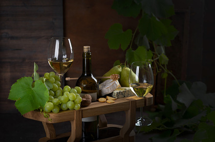 White wine in glasses, pear, cheese, a Food & Drink Photo by nafood