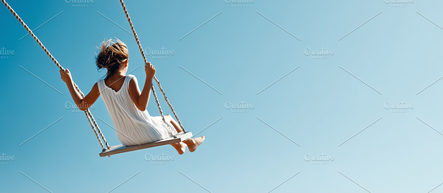 Young girl swings under a clear blue, a Person Photo by MistyDay