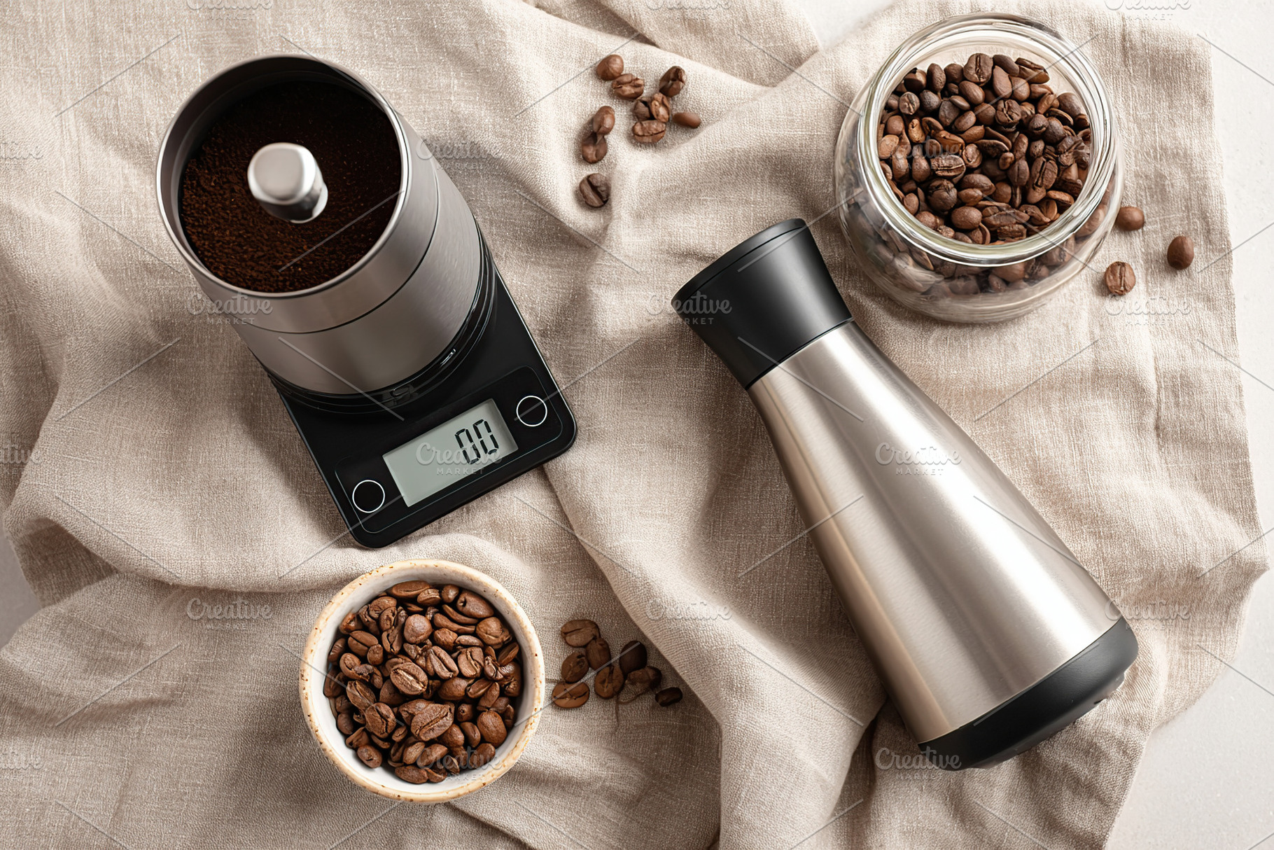 Coffee preparation setup with grinder, scale, and fresh beans on a linen cloth, a Food & Drink Photo by AlyaAnd