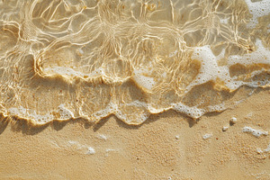 Close-up view of wet beach sand, a Photo by Pavel_design