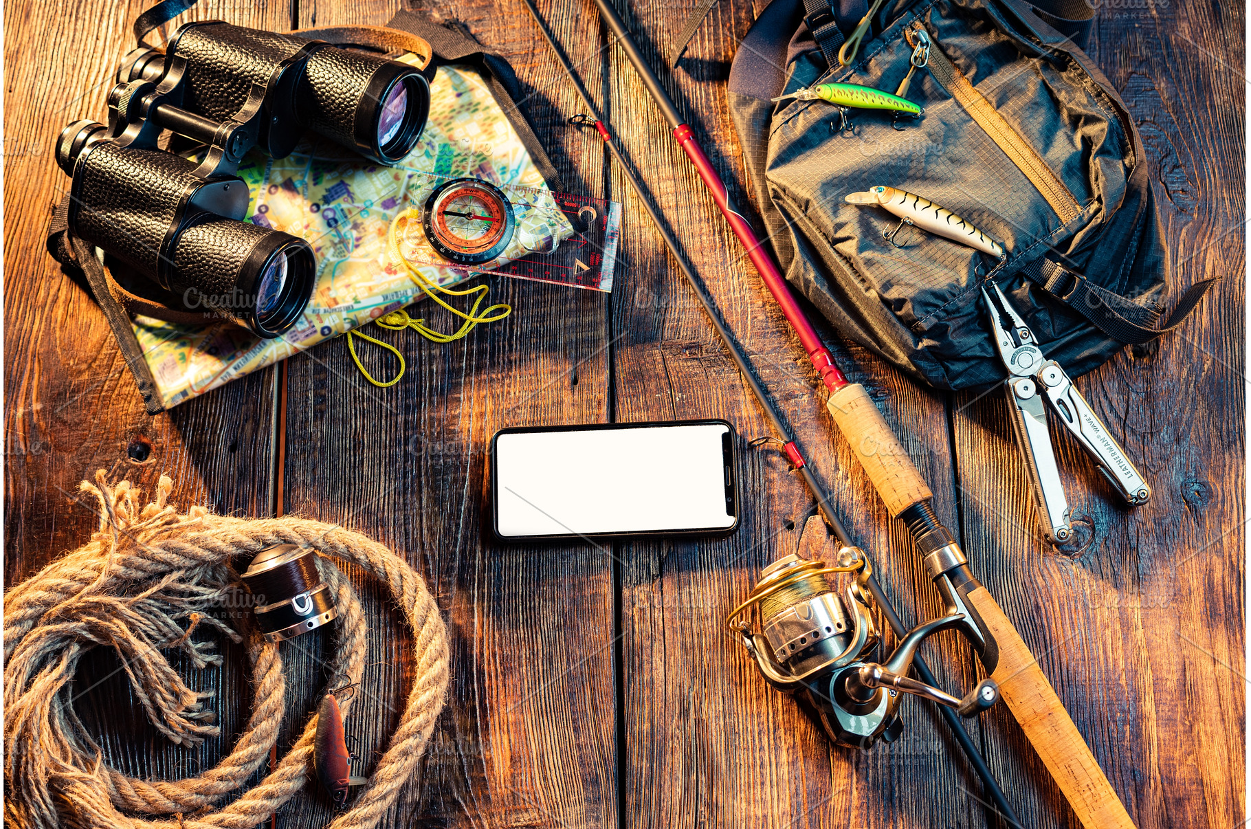Fishing tackle on a wooden, a Sports & Recreation Photo by Stockphoto by vzwer