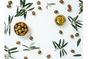 set of olives and olive oil on white, a Food & Drink Photo by Fascinadora