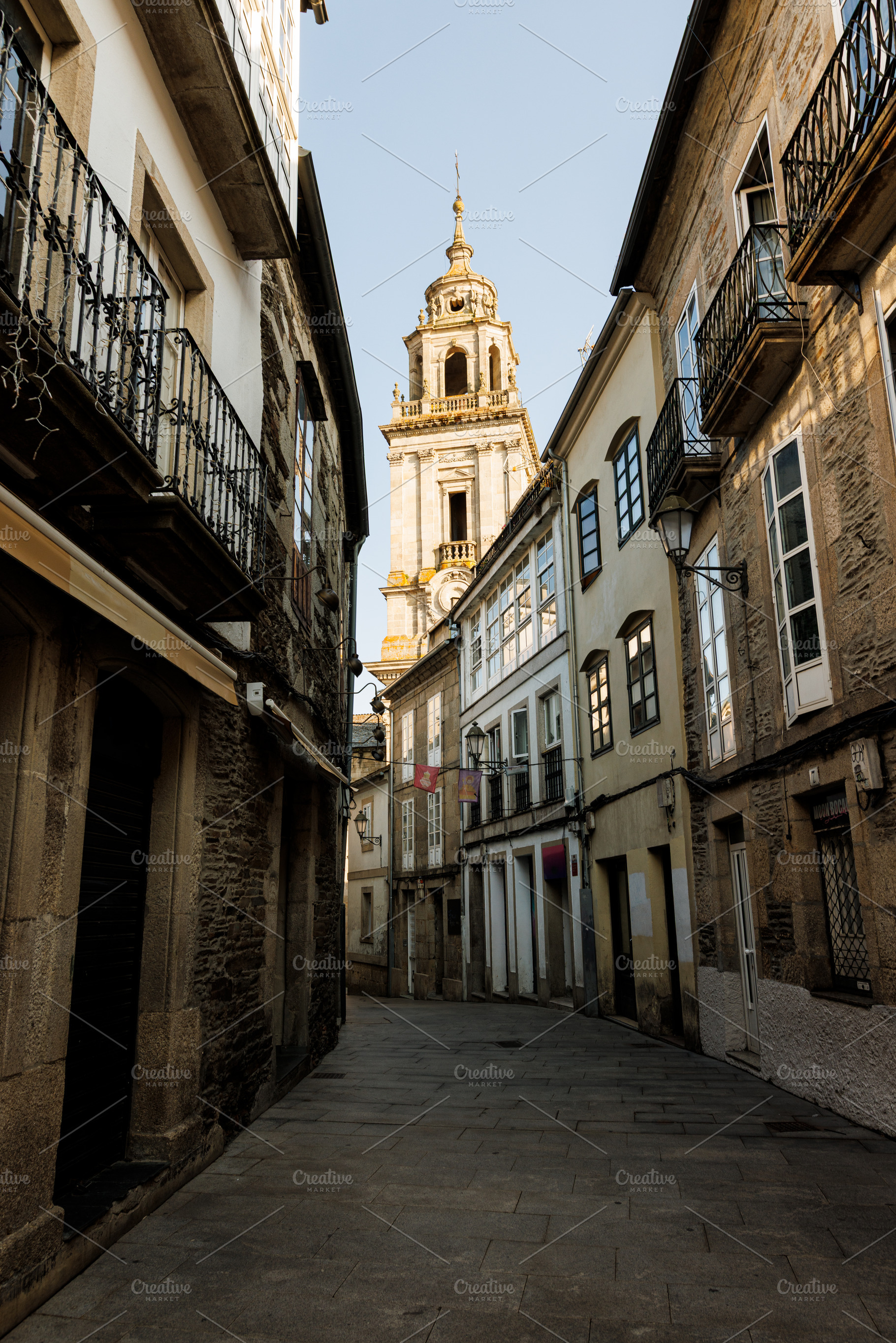 Narrow Cobblestone Street Leading to Cathedral Bell Tower, Lugo,, an Architecture Photo by Bepslabor