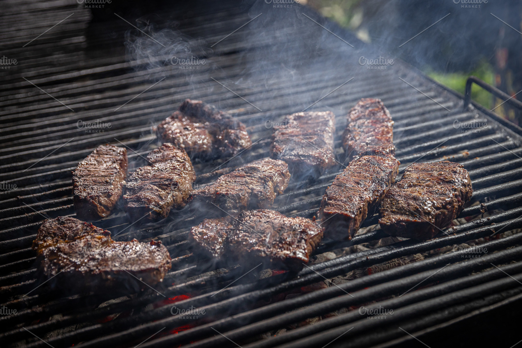 Grilled beef steak on the grill, a Photo by Grafvision photography